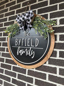 22" The Last Name Family Door Hanger | Black | White Frame