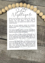 Load image into Gallery viewer, The Silent Nightingale | Nurse | Story Card Ornament
