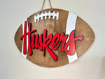 Load image into Gallery viewer, HUSKERS Football Shape Door Hanger
