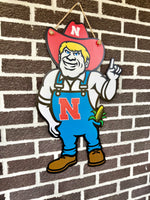Load image into Gallery viewer, Herbie Husker | Door Hanger
