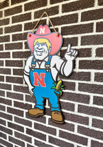 Load image into Gallery viewer, Herbie Husker | Door Hanger
